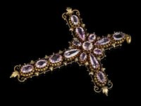 Lot 718 - Regency-style pink topaz cross pendant with...