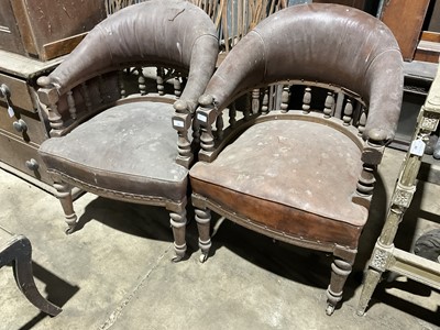 Lot 38 - Pair of Victorian leather tub chairs, on turned legs and brass castors