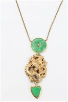 Lot 724 - Chinese jade / green hardstone pendant...