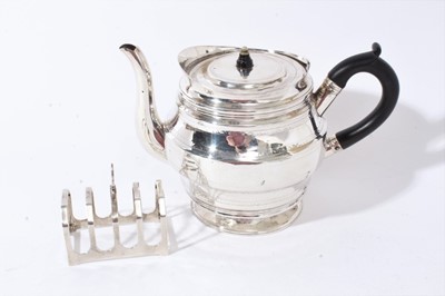 Lot 362 - George III silver teapot together with a silver toast rack (2)