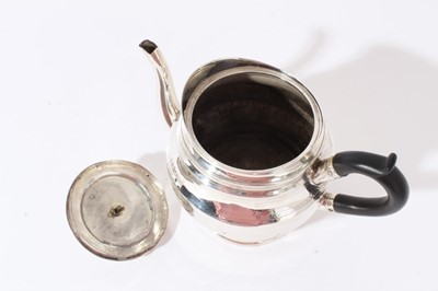 Lot 362 - George III silver teapot together with a silver toast rack (2)