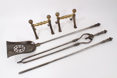 Lot 877 - Set of three 19th century polished steel fire irons together with a pair of Victorian steel and brass fire dogs