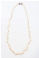 Lot 725 - Cultured pearl necklace with a string of...