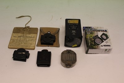 Lot 853 - Second World War Magnetic Marching Compass MKI, together with an aircraft cockpit gauge and other compasses.