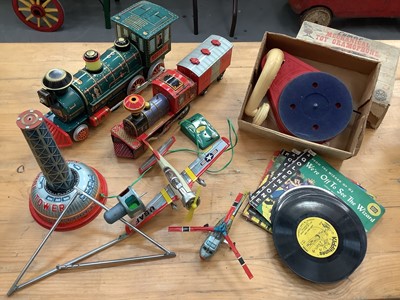 Lot 1864 - Japanese Tin Plate Battery Operated Western Special Locomotive, Air Control Tower, Puffing Pop Train and Louis Marz Mechanical Toy Gramaphone and Records, all boxed.