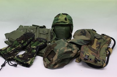 Lot 739 - One box of various military uniform items to include canvas webbing pouches, camoflauge hats etc (1 box)