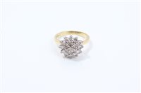 Lot 729 - Diamond cluster ring, the flower-head cluster...