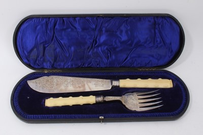 Lot 334 - Pair late Victorian silver and ivory fish servers in velvet lined fitted case