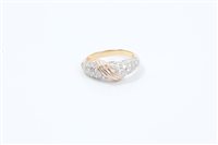 Lot 733 - Diamond dress ring with a pavé set diamond...