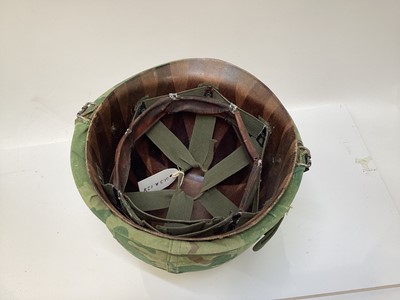 Lot 765 - American Vietnam era M1 steel helmet, complete with camo cover, liner and chinstrap, the cover with graffiti 'Khe Sanh 68, Semper FI, Charlie 13 kills'.