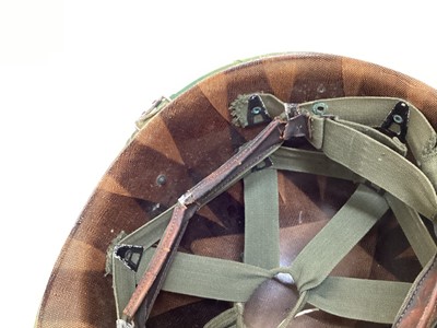 Lot 765 - American Vietnam era M1 steel helmet, complete with camo cover, liner and chinstrap, the cover with graffiti 'Khe Sanh 68, Semper FI, Charlie 13 kills'.