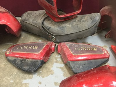 Lot 2085 - Honda CX500c tank, seat and side covers together with a selection of motorcycle parts