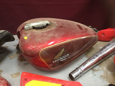 Lot 2085 - Honda CX500c tank, seat and side covers together with a selection of motorcycle parts