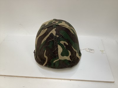 Lot 775 - American M1 steel helmet complete with liner, chinstrap and South Vietnamese camouflage cover, used by the Army of the Republic of Vietnam (ARVN) in support of US troops.