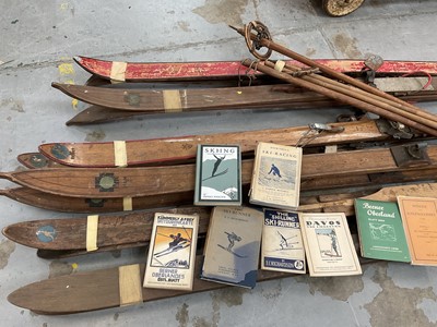 Lot 2694 - Collection of vintage skis and poles together with a small group of early 20th century skiing books