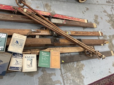 Lot 2694 - Collection of vintage skis and poles together with a small group of early 20th century skiing books