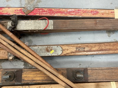 Lot 2694 - Collection of vintage skis and poles together with a small group of early 20th century skiing books