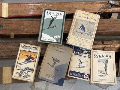 Lot 2694 - Collection of vintage skis and poles together with a small group of early 20th century skiing books