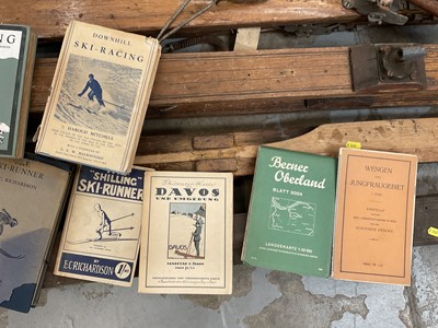 Lot 2694 - Collection of vintage skis and poles together with a small group of early 20th century skiing books