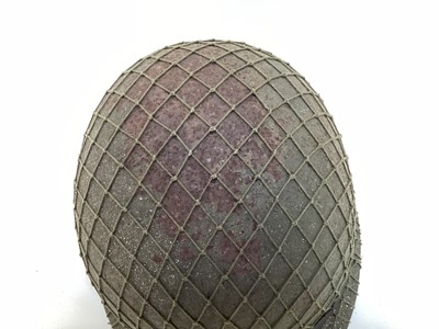 Lot 769 - Argentinian M1 steel helmet complete with camouflage painted finish, net, liner and chinstrap, believed to be a Falklands War trophy.