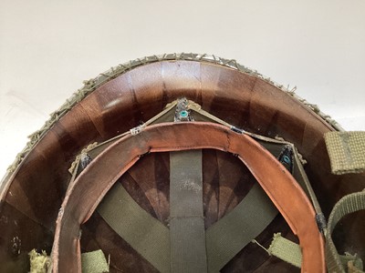 Lot 769 - Argentinian M1 steel helmet complete with camouflage painted finish, net, liner and chinstrap, believed to be a Falklands War trophy.