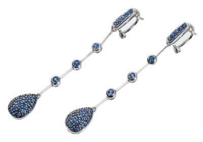 Lot 452 - Pair of 14ct white gold and blue sapphire pendant earrings