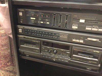 Lot 2395 - Technics hi-fi system, including cabinet, amplifier, tuner, cassette deck and two speakers