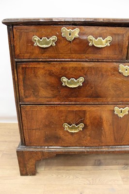 Lot 1302 - Early 18th century walnut veneered chest of two short and two long drawers