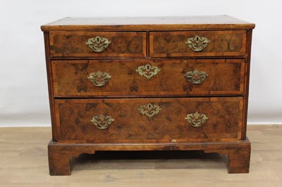 Lot 1303 - Early 18th century oyster veneered walnut and laburnum chest of two short and two long graduated drawers (alterations)