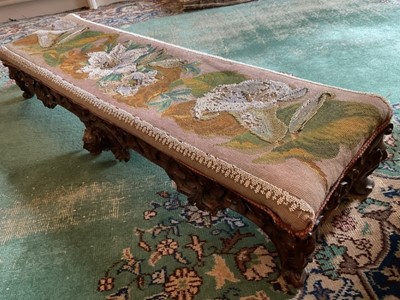 Lot 1307 - Victorian Gothic revival carved walnut long stool with original beadwork seat and carved masks