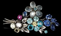 Lot 742 - Large 1950s multi-gem set floral spray brooch,...