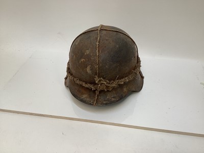 Lot 777 - Second World War Nazi M42 pattern steel helmet with wire cage, wires wrapped with twisted hessian, shell painted in field grey and camo. complete with liner, stamped with size 57.