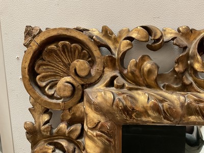 Lot 1322 - Antique baroque giltwood and gesso framed wall mirror