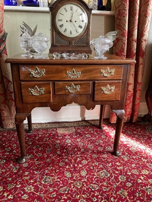 Lot 1325 - George II red walnut lowboy with one long and three short drawers on cabriole legs