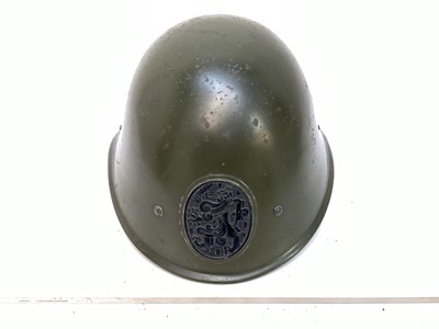 Lot 769 - Dutch M34 pattern steel helmet with Dutch Royal coat of arms and Lion of Nassau badge, in original factory green paint with liner and chinstrap.