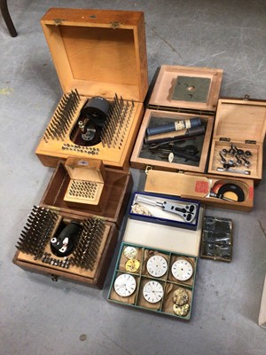 Lot 2718 - Extensive collection of watch makers' equipment to include a lathe, watch glasses, balance springs, punches, micrometers, vintage watches and  movements