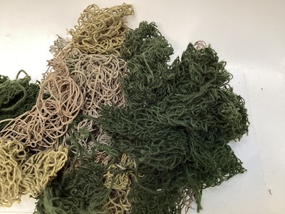 Lot 831 - Collection of 27 large helmet nets, mainly British and Austrian, NATO era, suitable for British MKIV, MKV, MK6 and US M1 style helmets.