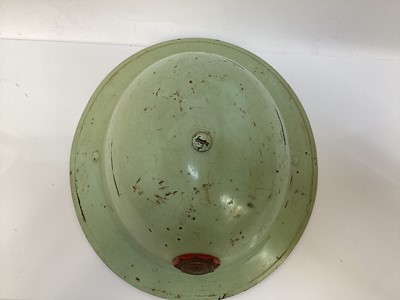 Lot 777 - Second World War British MKII steel helmet, painted green with National Fire Brigades Association badge to the front, with liner and chinstrap, inscribed 'Miller'.