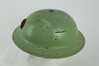 Lot 777 - Second World War British MKII steel helmet, painted green with National Fire Brigades Association badge to the front, with liner and chinstrap, inscribed 'Miller'.