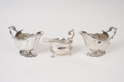 Lot 227 - Pair of late Victorian silver shell shape sauce boats London 1896, together with one other
