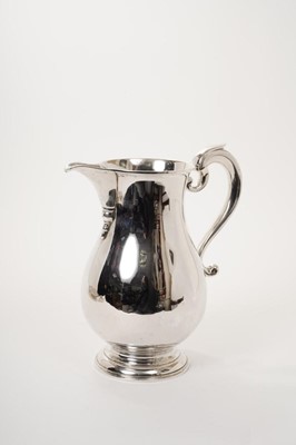 Lot 215 - Georgian style silver water jug of baluster form, by C. J. Vander Ltd, London 1962, 24oz