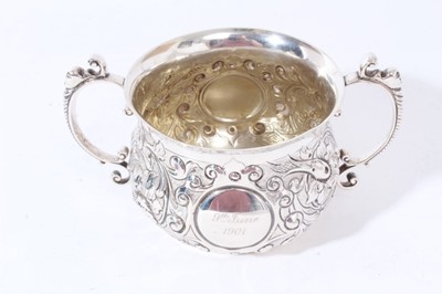 Lot 225 - Victorian silver two-handled porringer with embossed decoration