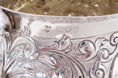 Lot 225 - Victorian silver two-handled porringer with embossed decoration