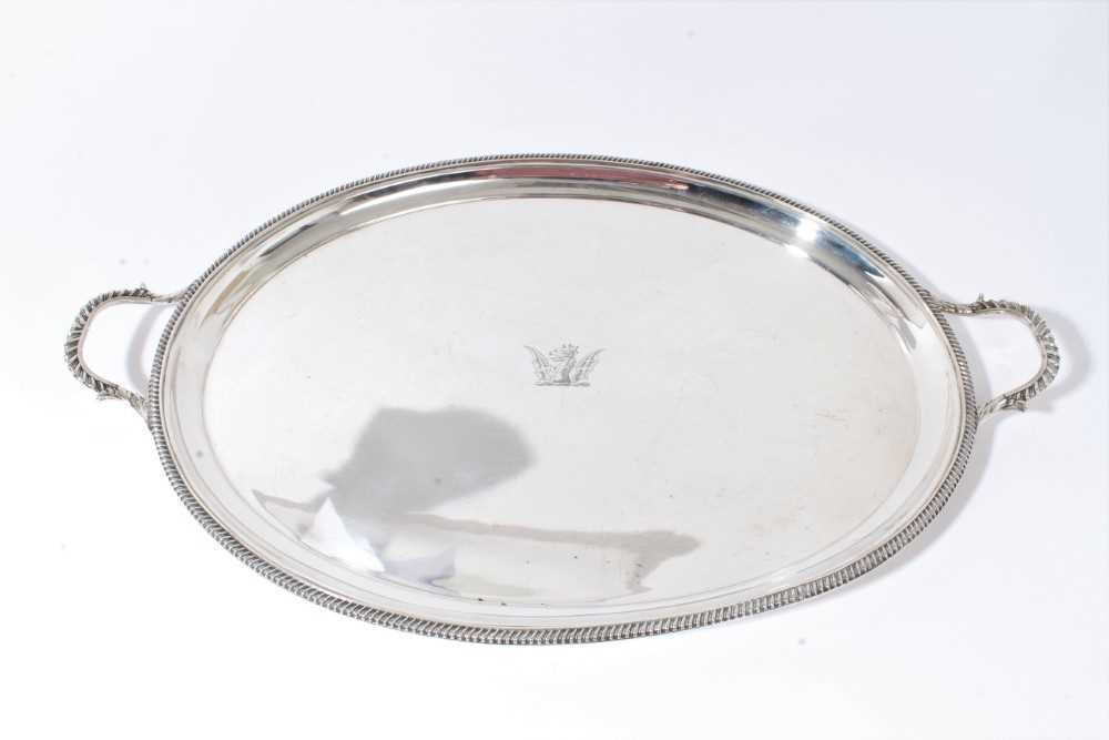 Lot 201 - Georgian style twin handled oval tray, with engraved armorial, CJV, London 1959, approximately 68oz