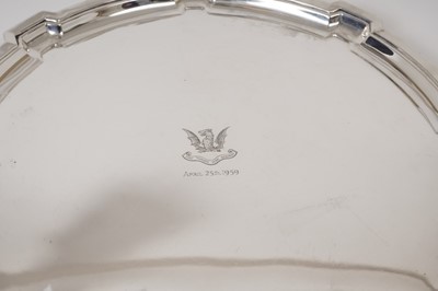 Lot 200 - 1930s silver salver of shaped circular form with engraved armorial by Roberts and Belk