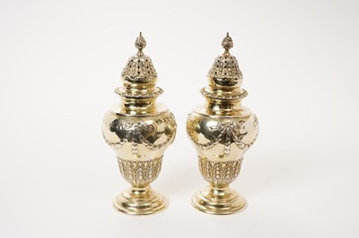 Lot 222 - Late Victorian pair of silver gilt castors and covers, London 1897/98