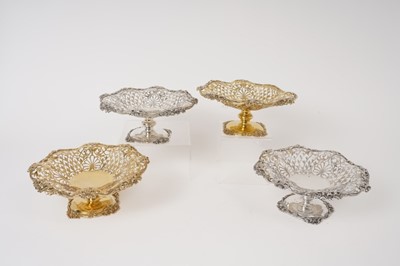 Lot 208 - Four Edwardian pierced footed dishes by Goldsmiths and Silversmiths, London 1906/7
