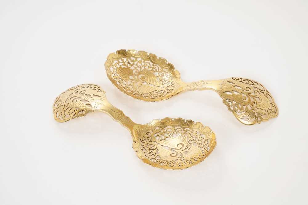 Lot 220 - Pair late 19th century silver gilt serving spoons, London 1897