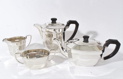 Lot 219 - Contemporary silver, composite three piece tea set, comprising teapot, hot water jug and milk jug