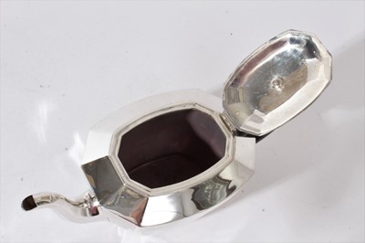 Lot 219 - Contemporary silver, composite three piece tea set, comprising teapot, hot water jug and milk jug